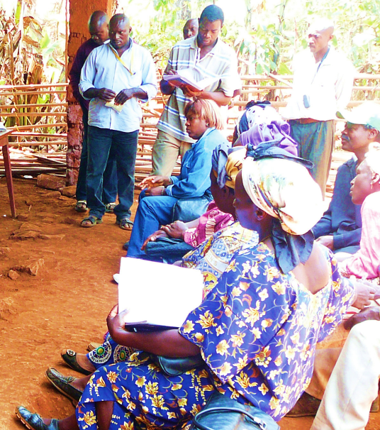 Figure 2: Farmers being taught about loans; © Roger Leakey