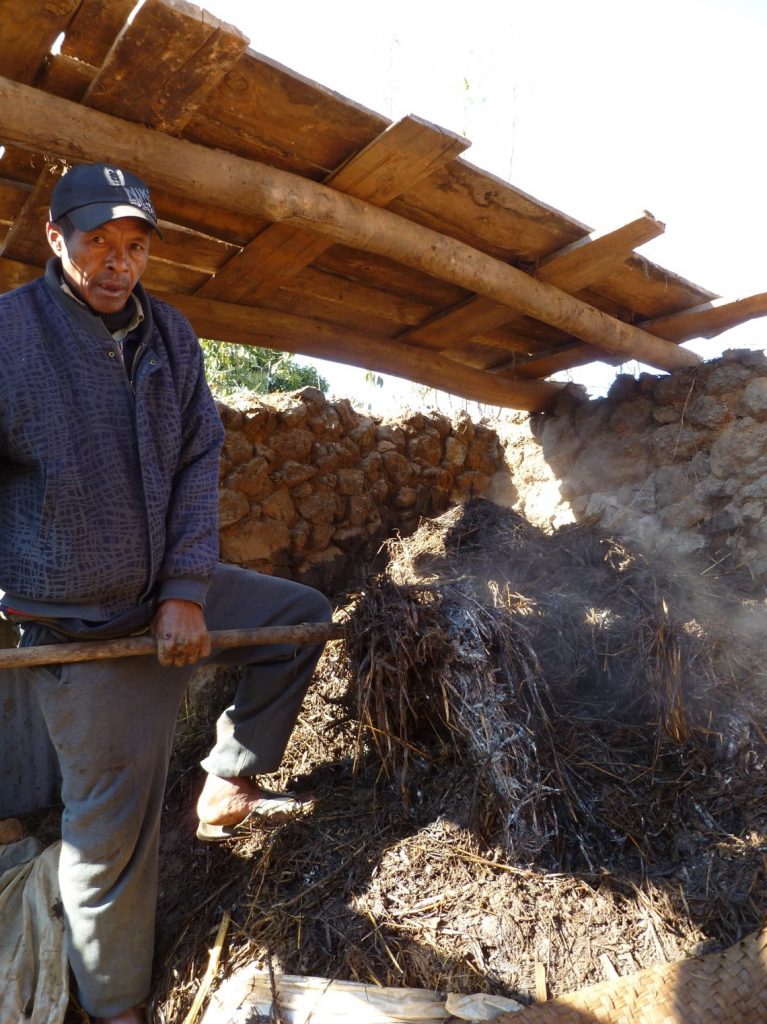 Figure 3. A farmer prepares high quality manure; © Paulo Salgado